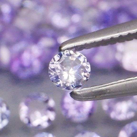Non stop flashing 3.85ct diamond cut Tanzanite set