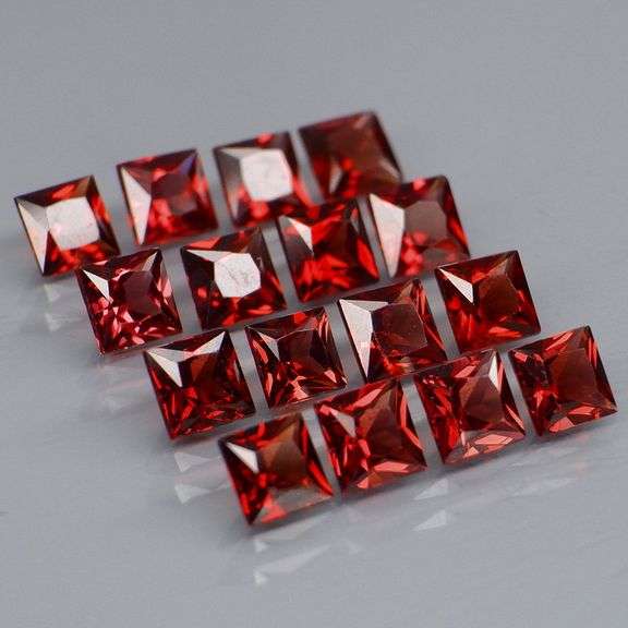 Tremendous 6.79ct princess cut cherry red Garnet set