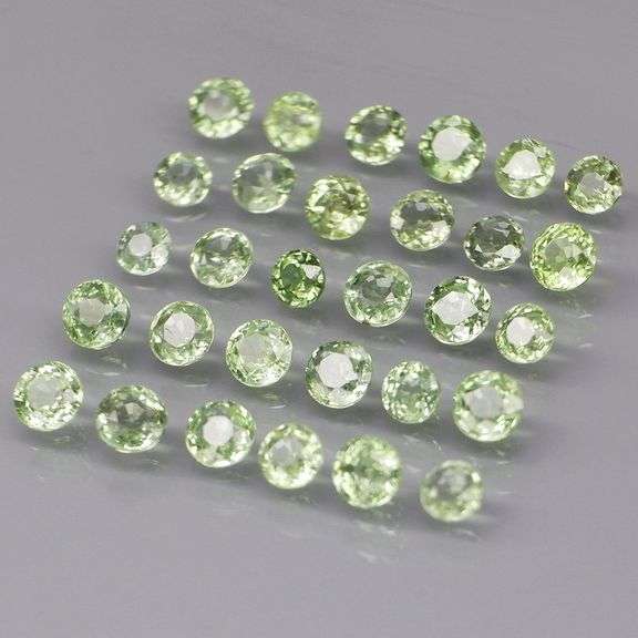 Awesome 4.06ct diamond cut GREEN Sapphire set