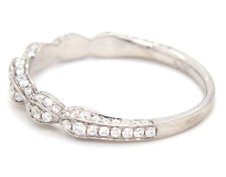 18kt White gold 10ctw Pear and round Moissanite wedding set