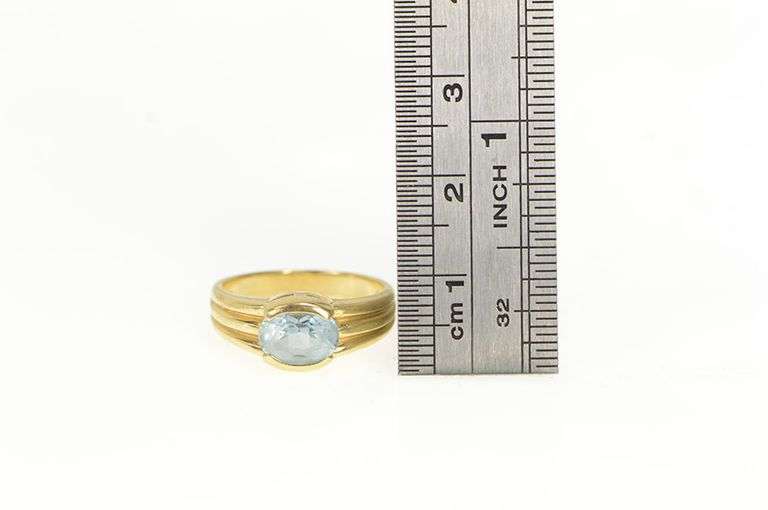 14K Yellow Gold Oval Blue Topaz Grooved Statement Ring