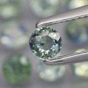 Heated only! 3.55ct blue green Sapphire set