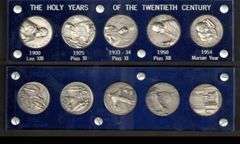 5 Coins The Holy Years of the Twentieth Century encased in hard plastic