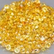 Awesome 5.72ct round cut yellow Sapphire set