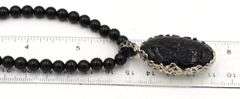 Black onyx beaded necklace with pendant