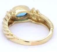14kt Yellow gold Bezel set oval blue topaz twisted ring