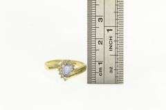 14K Yellow Gold Pear Cut Tanzanite Diamond Halo Ring
