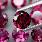 Rich 4.93ct round cut violet pink Rodolite Garnet set