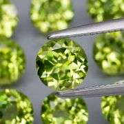 Dazzling 4.90ct untreated apple green Peridot set