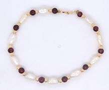Fresh water pearl and Garnet and yellow gold bead bracelet