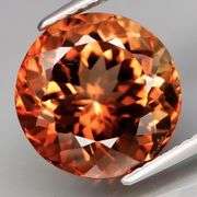 Rich red amber 7.79ct Imperial Topaz solitaire