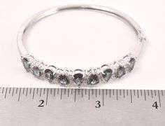 Stunning 6.00CTW Mystic Quartz & 0.85CTW White Topaz Bracelet in Sterling Silver