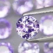 Glittering 3.17ct bright blue violet Tanzanite set