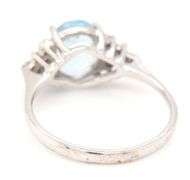 10kt White gold oval Aquamarine and diamond ring