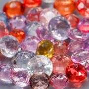 Glittering 38 piece 9.38ct fancy color Sapphire set