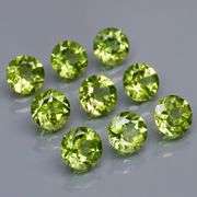 Dazzling 4.90ct untreated apple green Peridot set