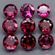 Rich 4.93ct round cut violet pink Rodolite Garnet set
