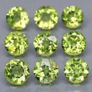 Dazzling 4.98ct untreated apple green Peridot set