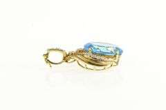 14K Yellow Gold Oval Blue Topaz Diamond Accent Elaborate Pendant