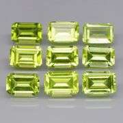 Emerald cut! Unheated! 5.53ct Peridot set
