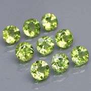 Dazzling 4.98ct untreated apple green Peridot set