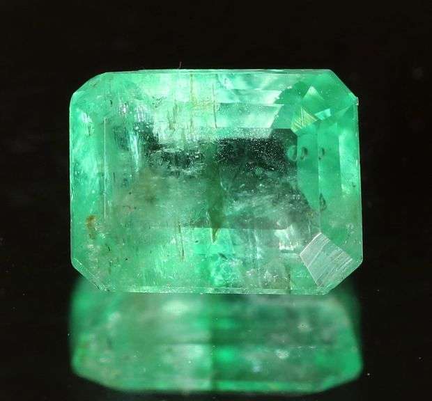 Stunning .65ct bright green Colombian emerald