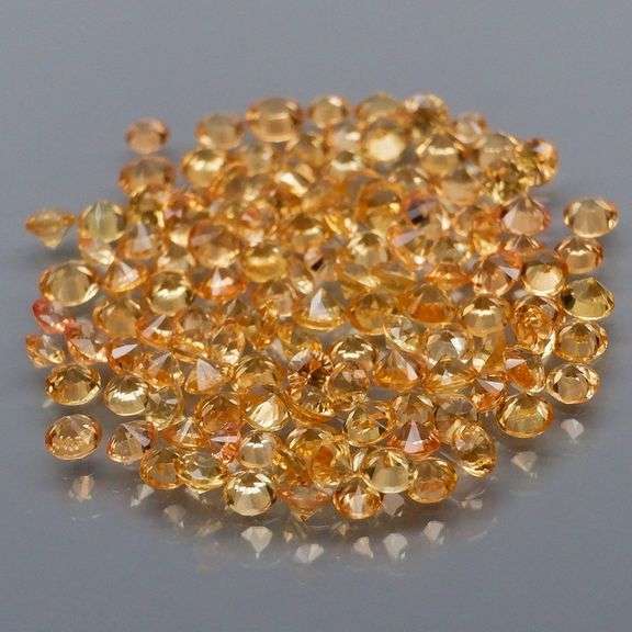 Awesome 3.70ct round cut yellow Sapphire set