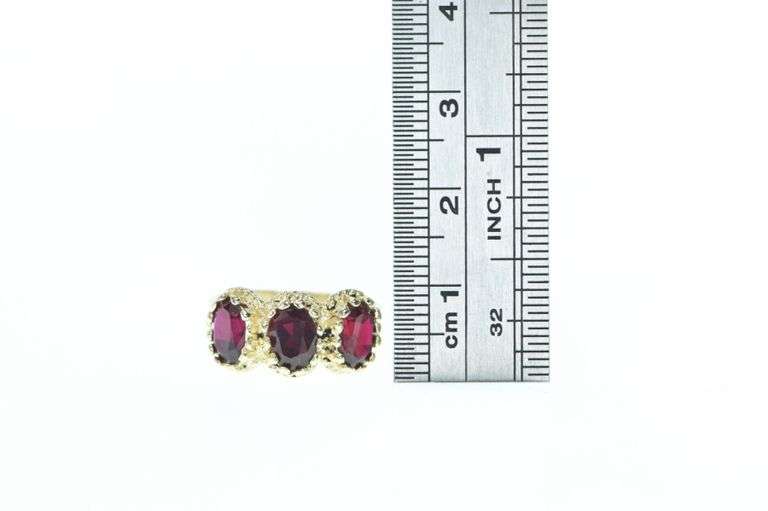 14K Yellow Gold Ornate Three Stone Oval Garnet Ring