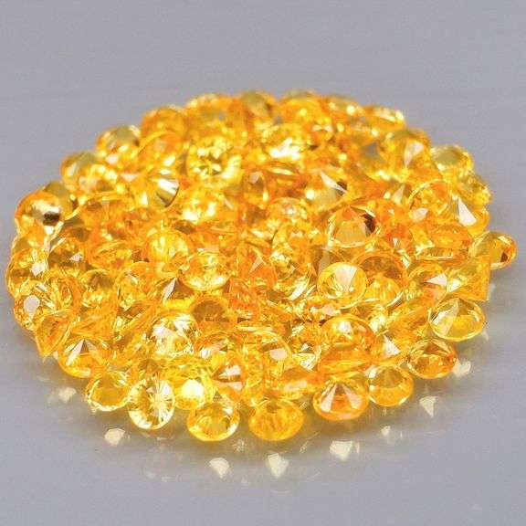 Fantastic 3.83ct diamond cut golden Sapphire set