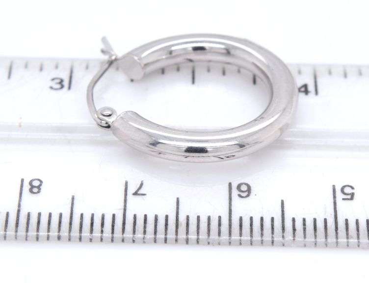 3 Pairs of 14kt white gold earrings