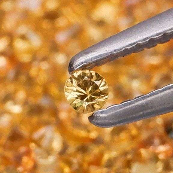 Awesome 3.70ct round cut yellow Sapphire set