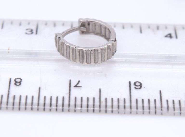 3 Pairs of 14kt white gold earrings