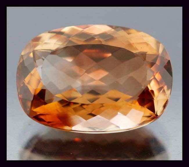 Exquisite 14.89ct whiskey color Imperial Topaz