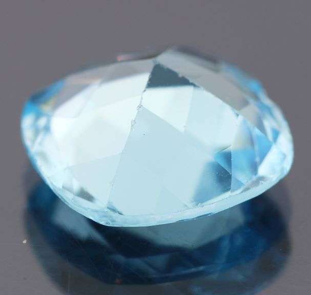 Sparkling 13.09ct cushion cut sky blue Topaz