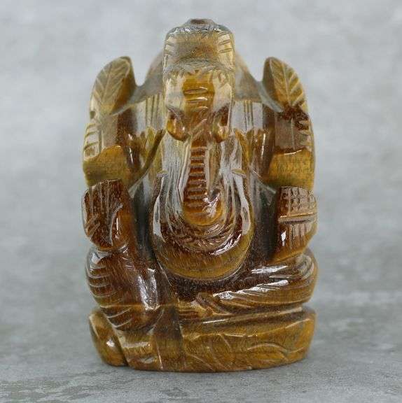 Detailed 477.50ct Tiger Eye carving