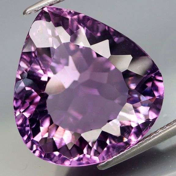 Wonderful 14.87ct concave cut Amethyst