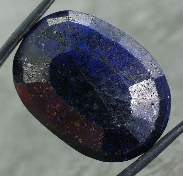 Lavish 70.64ct oval cut ink blue Sapphire