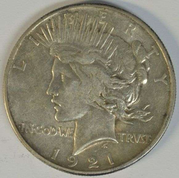 Upper end 1921 Peace Silver Dollar. Scarce first-year issue