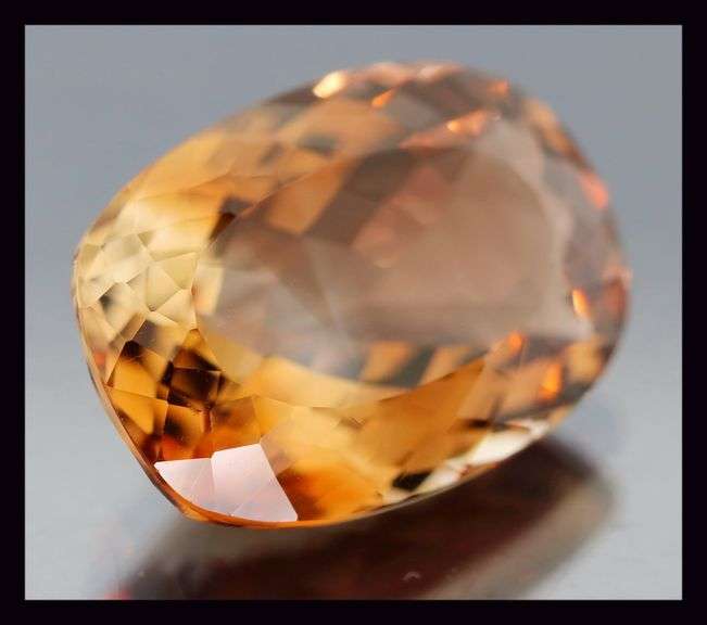 Exquisite 14.89ct whiskey color Imperial Topaz