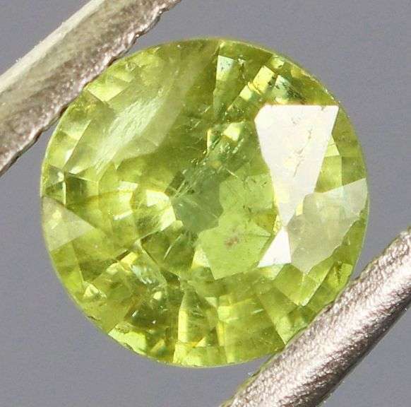 Yellow green .50ct Demantoid Garnet solitaire