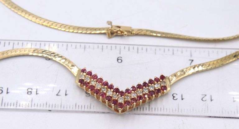 Set of 14kt Yellow gold diamond and ruby necklace, bracelet, ring and matching earrings