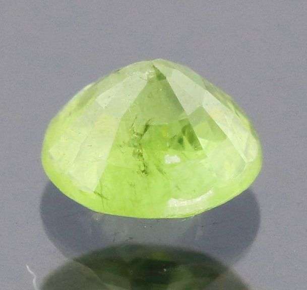 Dazzling .49ct Demantoid Garnet solitaire