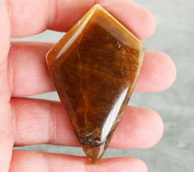 Kite cut! 201.97ct Golden Tiger Eye cabochon