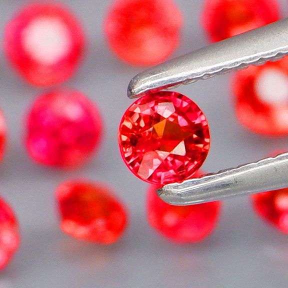 Uniquely colored 2.99ct imperial red Sapphire set