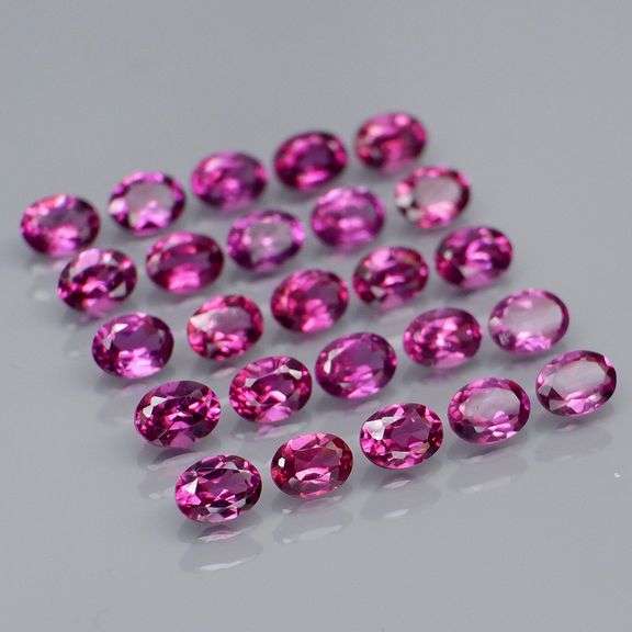 Ravishing 5.72ct violet pink Rhodolite Garnet set