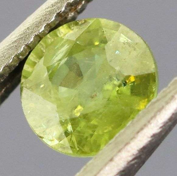 Yellow green .50ct Demantoid Garnet solitaire
