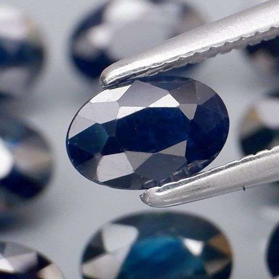 Heated Only! 4.61ct midnight blue Sapphire set