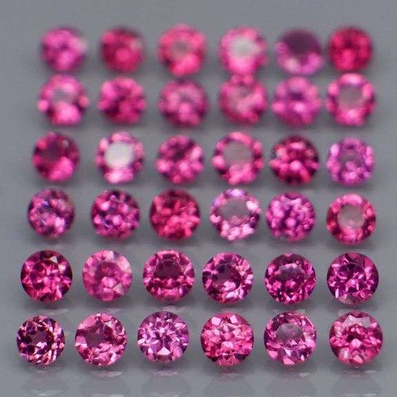 Diamond cut 5.50ct violet pink Rhodolite Garnet set