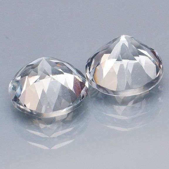 Superb 7.18ct high fire 9mm diamond white Topaz pair