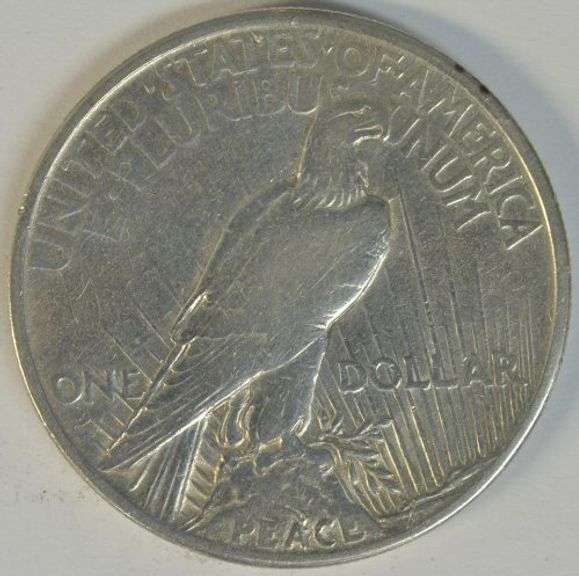 Higher end scarce 1921 Peace Silver Dollar. Cleaned